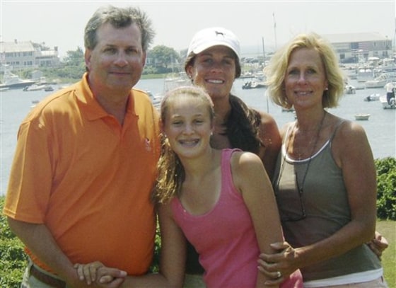 William and Jennifer Petit are seen with daughters Michaela, front, and Hayley in June 2007 on Cape Cod, Mass.
